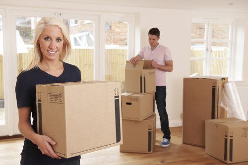 Moving van and packed household items in a Hoxton street