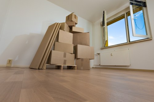 Packed boxes and furniture ready for self storage in Hoxton