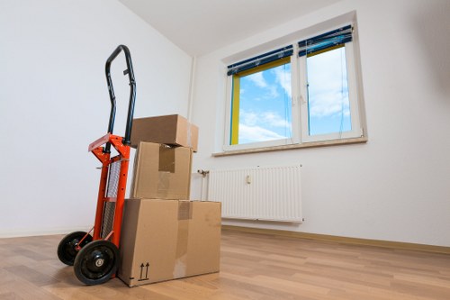 Packed boxes and wrapped furniture ready for a flat move